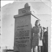 Sidonia standing at the monument to those who perished at Bergen Belsen, April, 1946. Monument